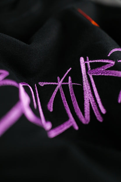 "TAGGIN'" CREW NECK SWEATSHIRT